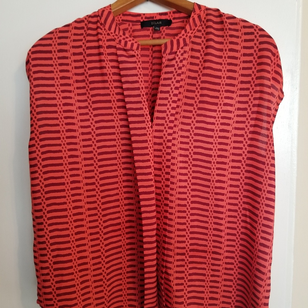 Bright orange blouse